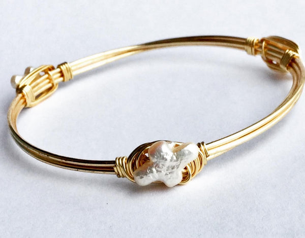 the BOBBY Bangle with Fresh Water Cross Pearl