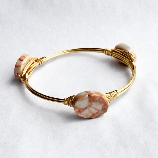the BOBBY Bangle with Pink Jasper Oval Stone