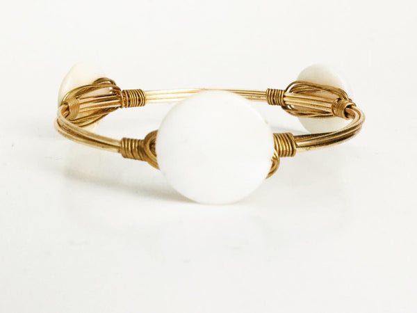the BOBBY Bangle with White Shell Coin